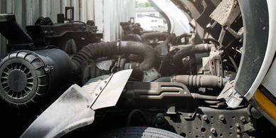 Close-up of a vehicle engine with detailed components.