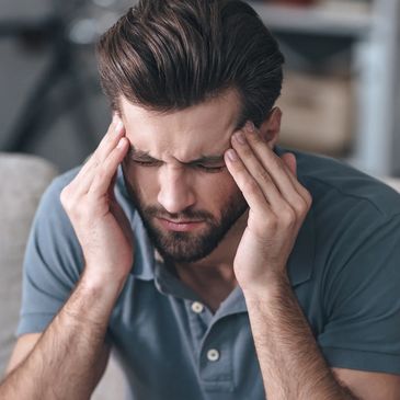 Man holding his head
