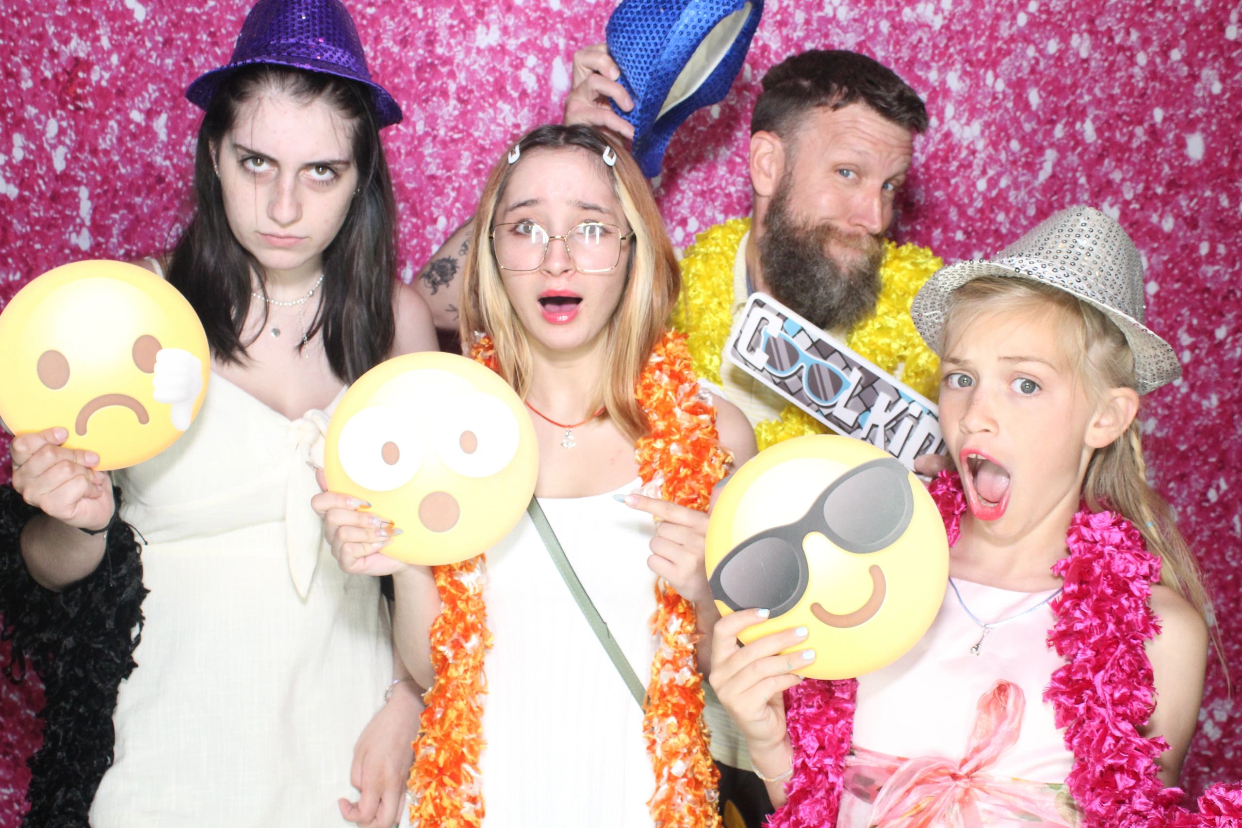 Family taking a picture in the photo booth