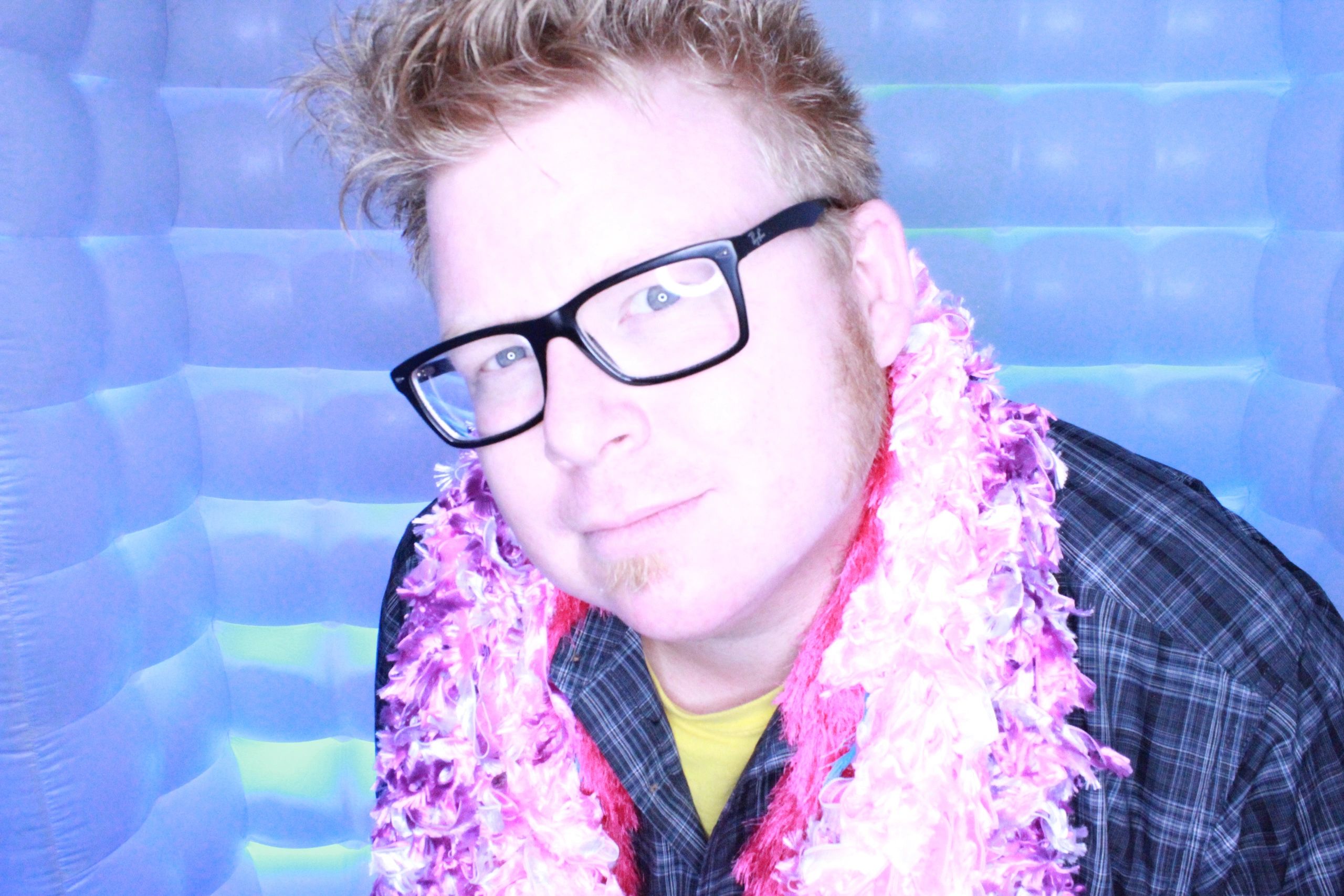 Guest taking solo shots in the photo booth.