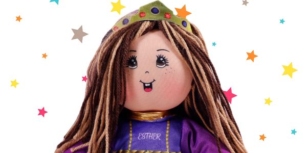 Esther doll dressed in purple and wearing a crown.