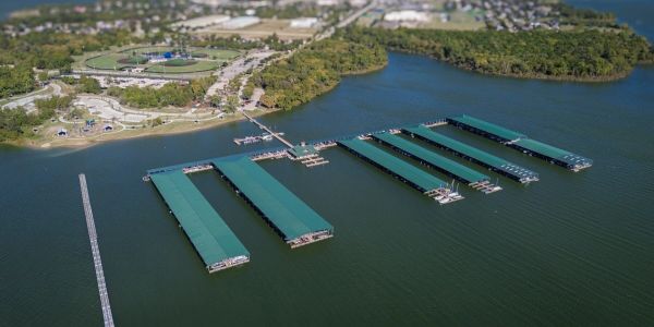 Aerial view of covered docks on a lake.
