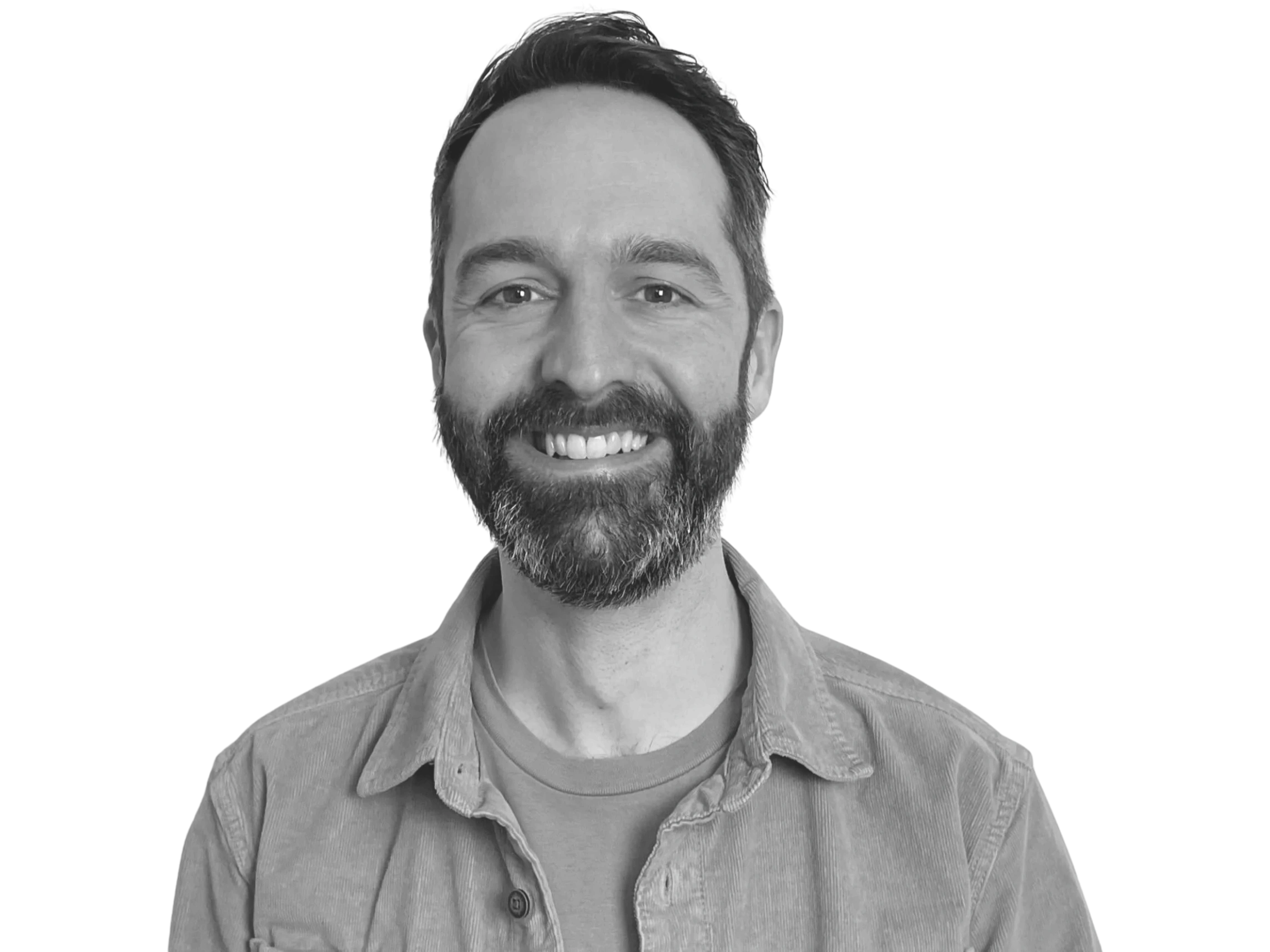Mind body practitioner Danny Mangan smiling