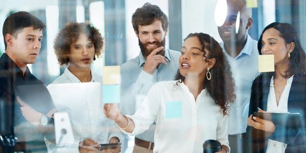 Consultants working on a strategy design.