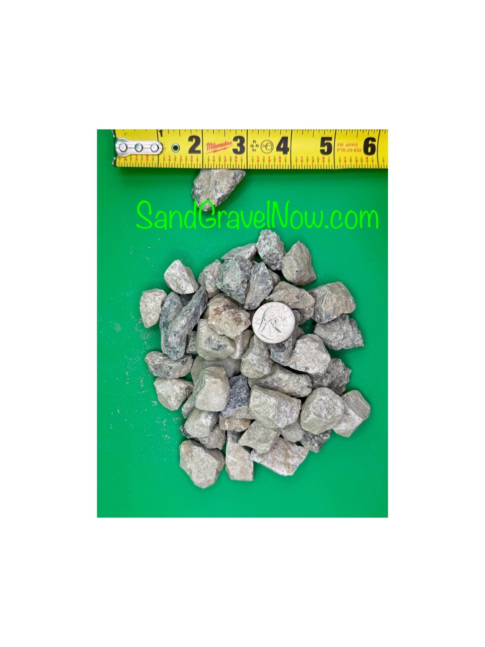 Pile of small gray gravel rocks with quarter and measuring tape.
