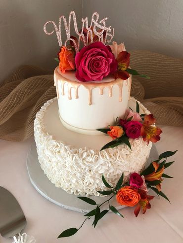 Ruffle, gold drip, flowers wedding cake