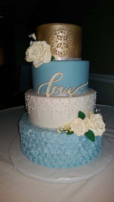 Dusty blue, copper, white wedding cake