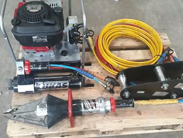 Industrial hydraulic equipment on a wooden pallet.
