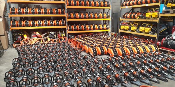 A warehouse filled with organized power tools and equipment.