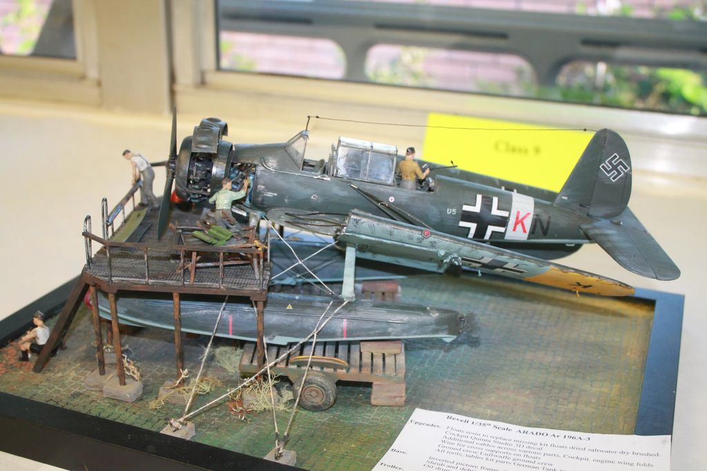 Detailed scale model of a WWII German ARADO Ar 196A-3 floatplane with maintenance figures.