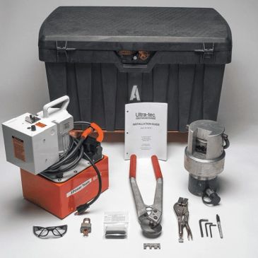 A kit of industrial tools and equipment with a large black storage container.