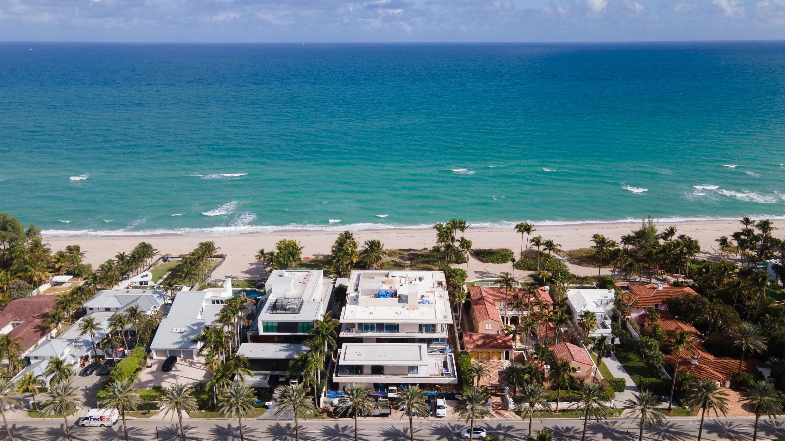 Drone view of multi-million dollar home construction progress in Golden Beach, Miami 