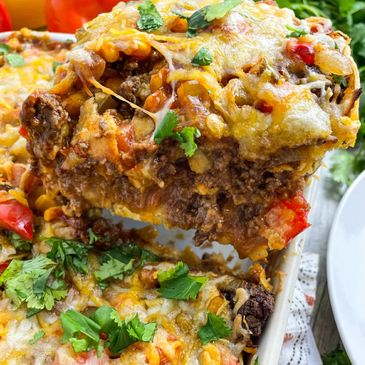 A cheesy, hearty casserole loaded with ground beef, corn, and fresh herbs.