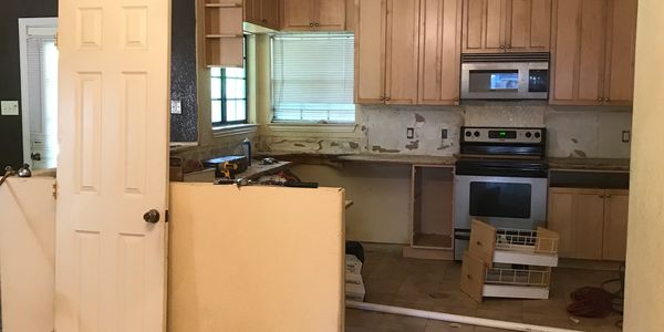 Kitchen in need of remodeling updates.