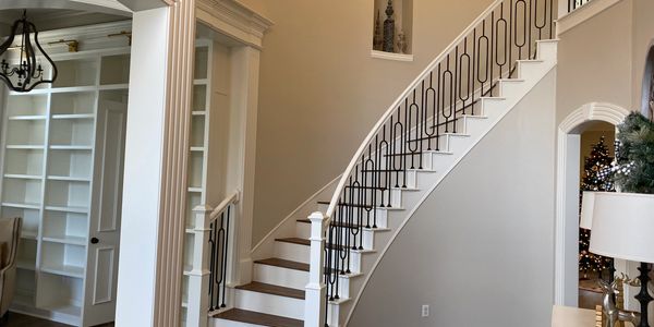 A custom stair, custom library and custom wood floor remodel in McKinney, TX