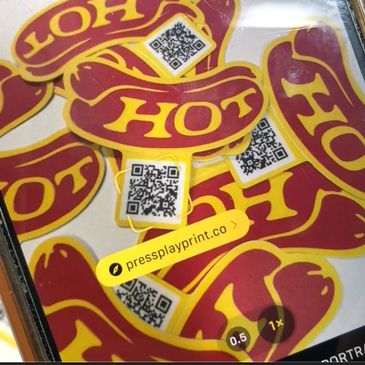 Custom printed stickers with attached QR codes