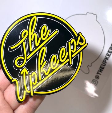 Image of sticker peeled away from it's backing