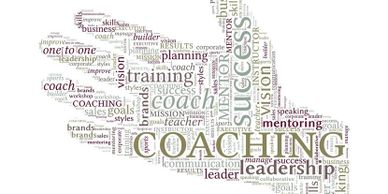 Word cloud shaped like a hand with coaching and leadership terms.
