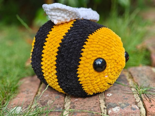 A jumbo bee plushie