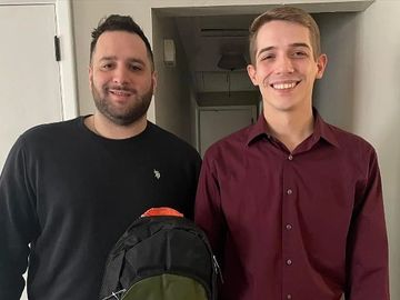 Co-founders Cole Barefoot and Spencer Marnich with a Dream Start Foundation d backpack 