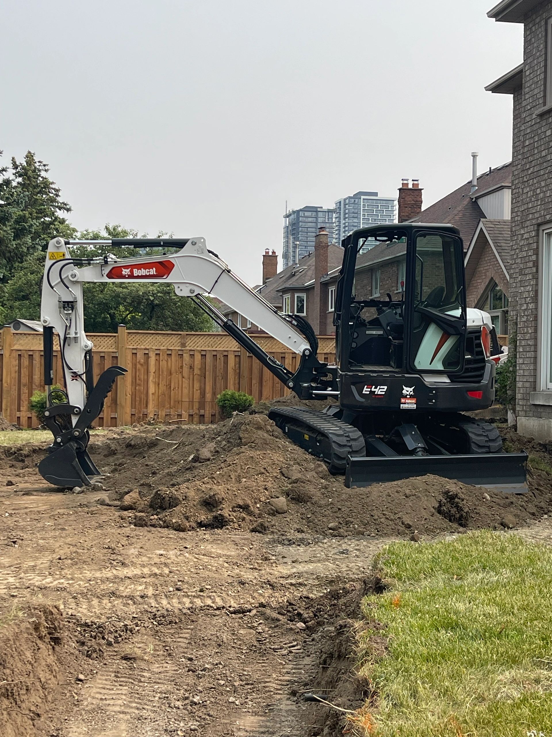 Acal general contracting interlock excavation post hole drilling