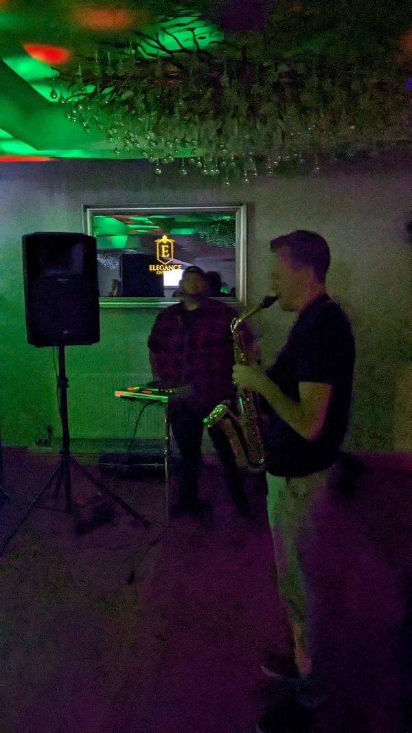 Rowan on sax with live percussion @ Elegance over 30s 