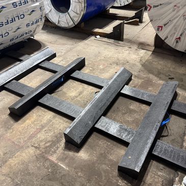 rubberized-coil-storage-systems for safe storage of Carbon Steel, Aluminum, and Stainless Steel coil