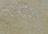 This texture is embellished with raised stencils.