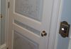 French trompe l'oeil ornamentation on elevator door