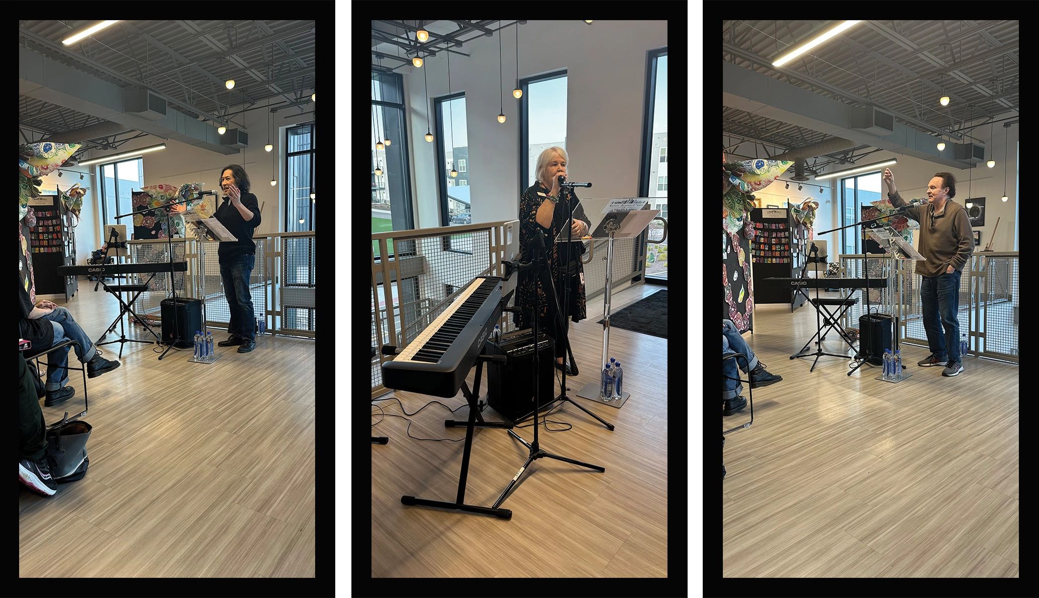 Three individuals speaking or performing with microphones in a modern indoor space with a keyboard.