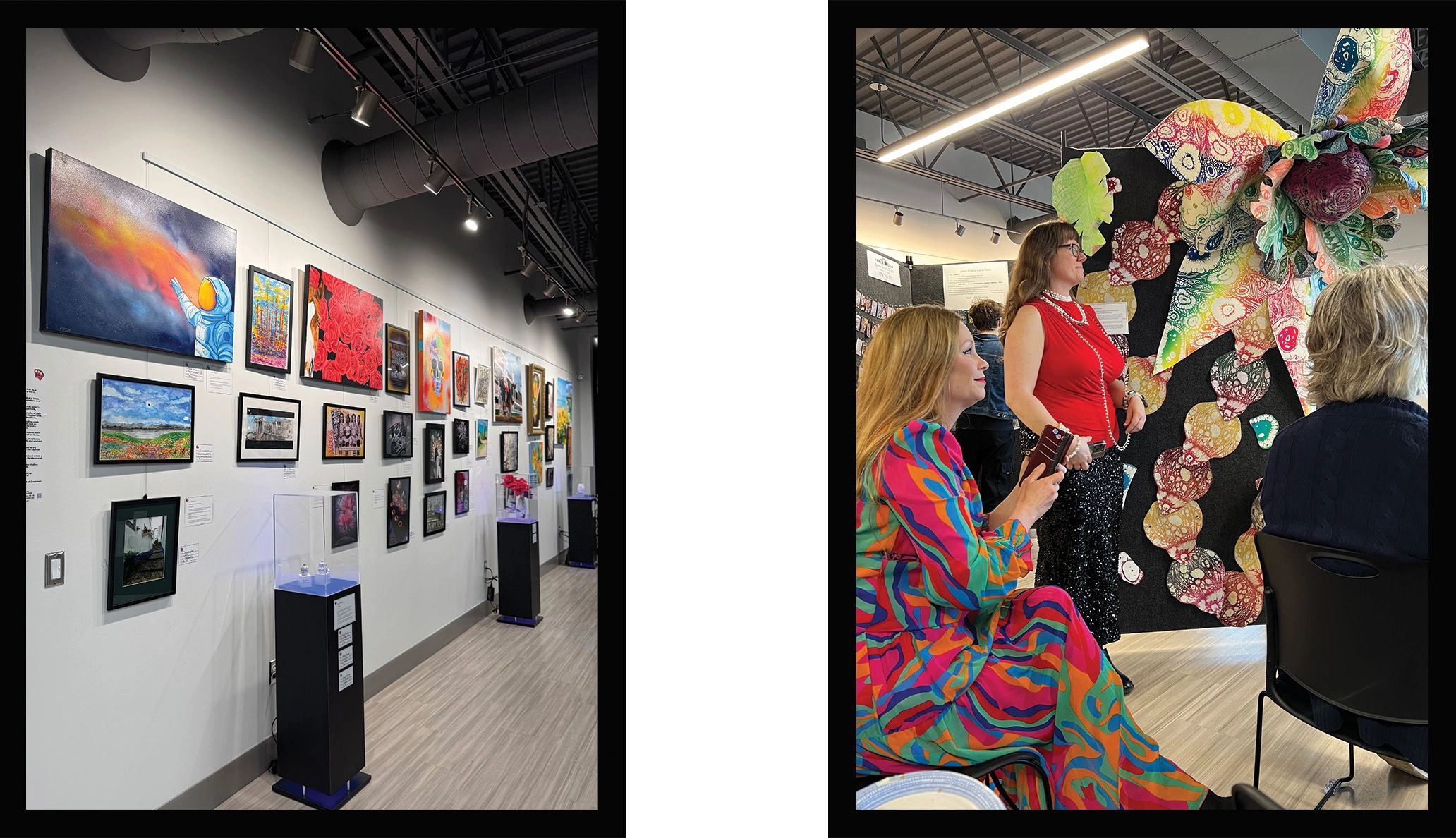 Art gallery featuring colorful paintings and attendees admiring a large floral artwork.