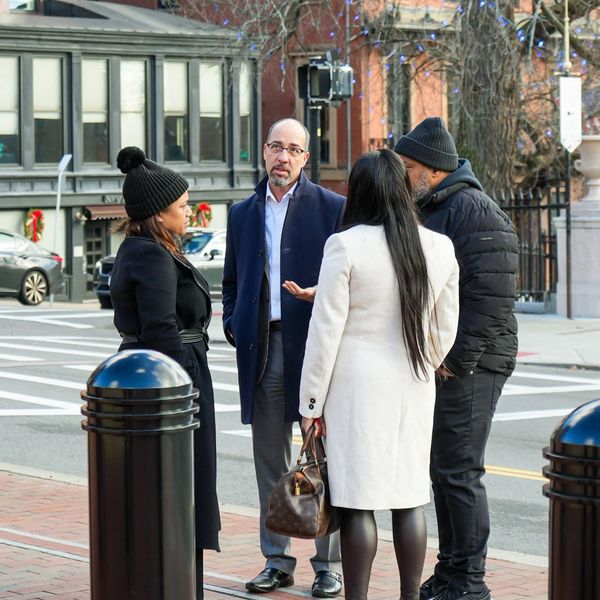Discussing legislation on Beacon Hill