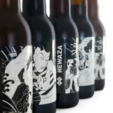 Five black bottles with Japanese-themed designs.