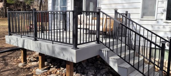 Deck with black metal railings