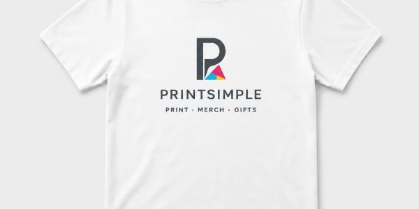 White t-shirt featuring the PRINTSIMPLE logo with colorful geometric design.