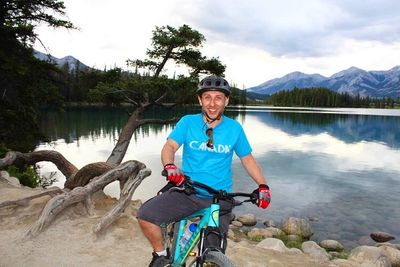 bike by lake green clear magic tree jasper national park