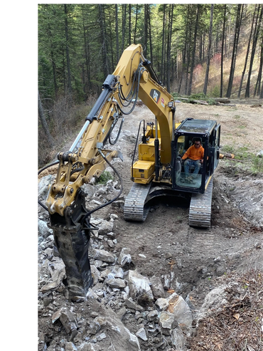 Excavation breaker attachment to level a pad