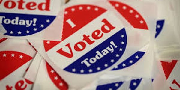 Pile of red, white, and blue "I Voted Today!" stickers.