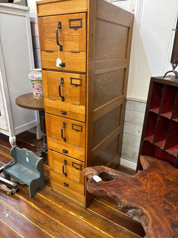 Oak, four drawer filing cabinet.  $650.