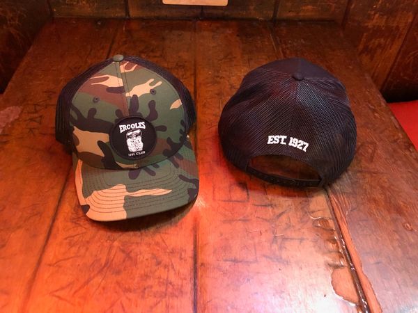 Camo hat with lucky monkey.
