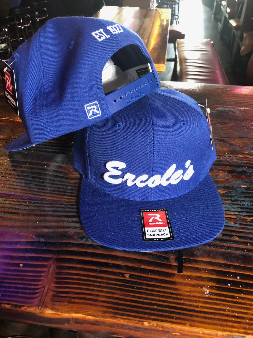 Blue flat bill Ercole's hat.

