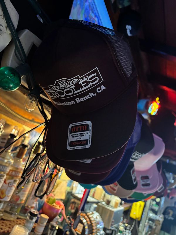 Black foam trucker with white outline of sign