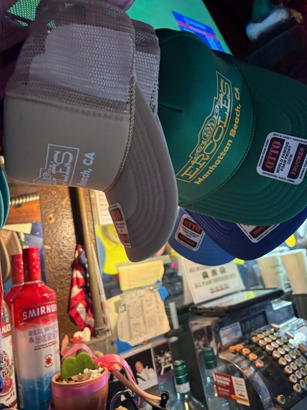 Tan  foam trucker and green foam trucker.
