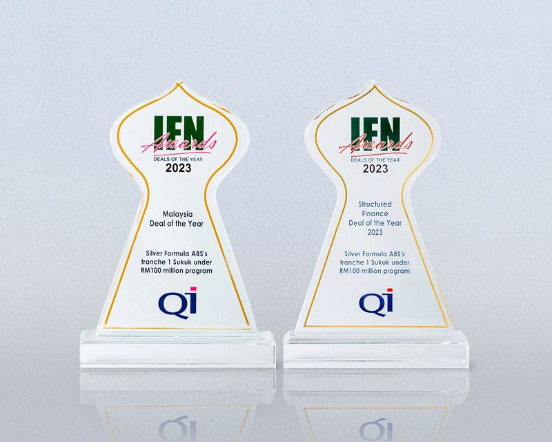 Shophouse building (commercial townhouses) under construction on Phu Quoc Island, Vietnam. Modern commercial building under construction for elite area of Vietnam. These are low-rise mixed-use buildings, often referred to as townhouses or shophouses, where ground floor is designated for commercial use and upper floors for residential use. Similar projects are being developed by leading investors in Hanoi and Ho Chi Minh City. Contemporary architecture features panoramic glazing and light-colored facades, stone basements, and landscaped grounds.