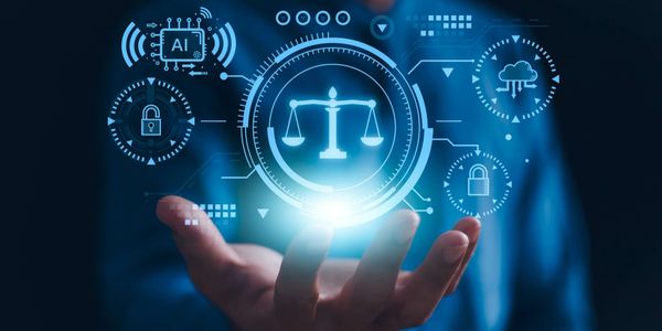 Hand holding digital scales symbolizing AI and cybersecurity in law.