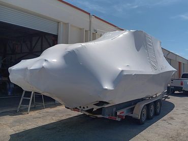 Boat shrinkwrap services.