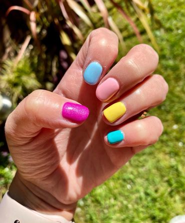 Pastel rainbow coloured Gelish nails