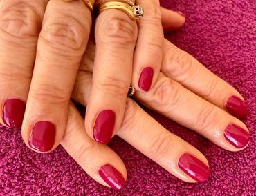 Dark pink Gelish nails 