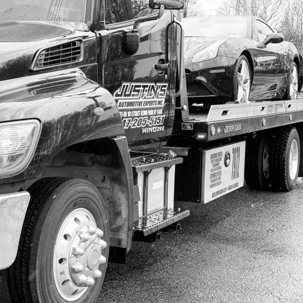 Flatbed Towing service for a Ferrari car 