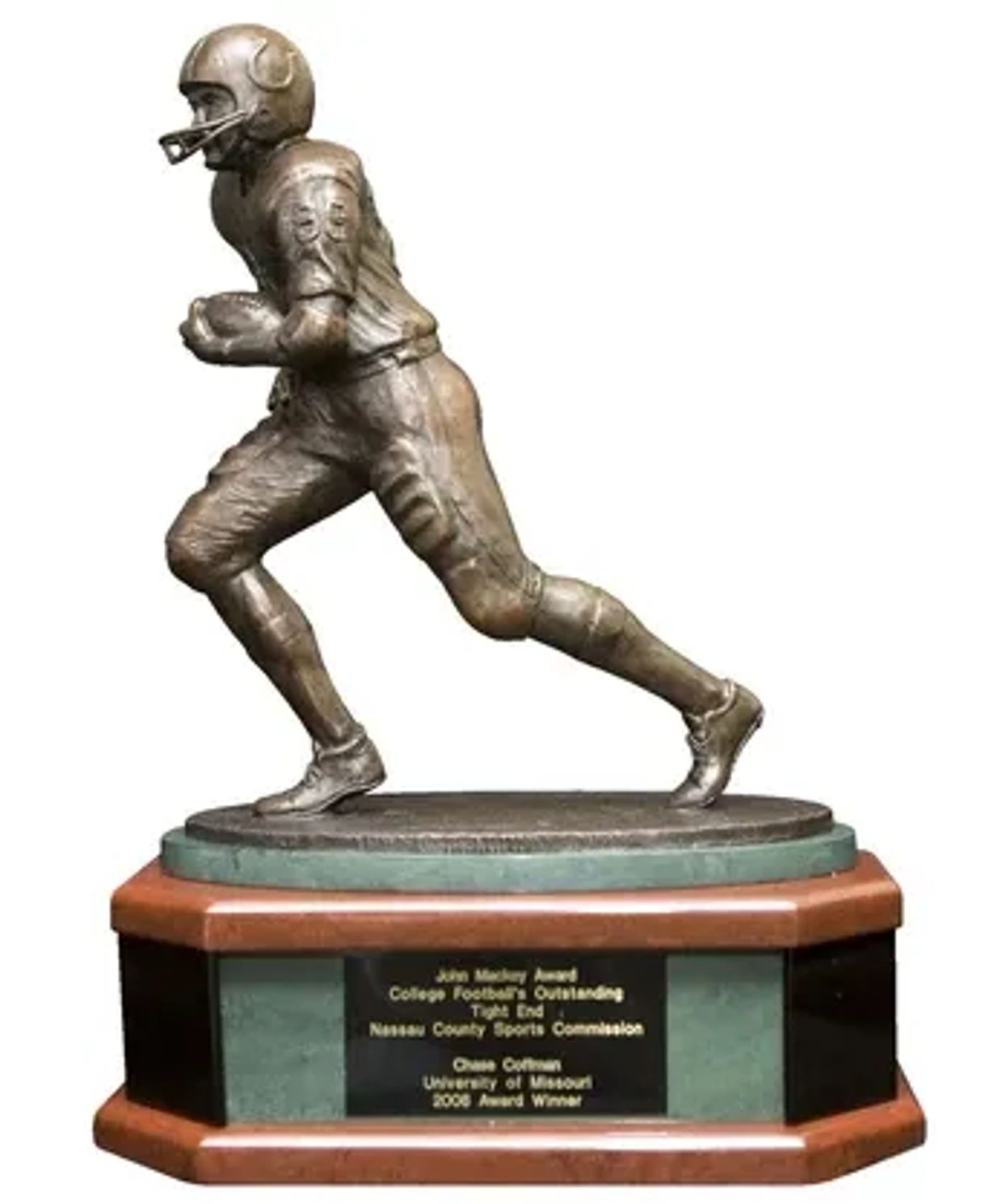 Bronze football player trophy on a wooden base.